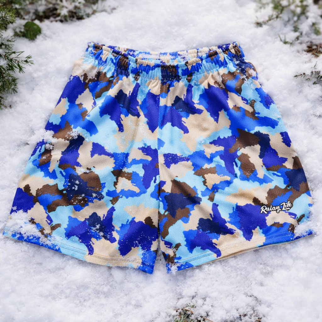 Blue and beige camouflage shorts on a snowy background, Dominican shorts